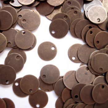 7MM BRASS COIN CHARM